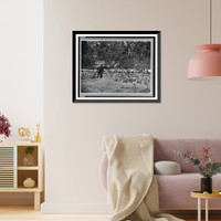 Historic Framed Print, [Soldier standing at graves of Federal soldiers, along stone fence, at Burnside Bridge, Antietam, Maryland],  17-7/8" x 21-7/8"