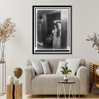 Woman combing her hair in ladies' toilet room, tourist sleeper, in railroad car, Antique Poster