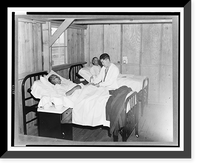 Historic Framed Print, Manzanar, Calif., 1942. Dr. James Coto, Los Angeles physician and surgeon, examining an elderly patient in the emergency hospital at the War relocation authority center for evacuees of Japanese ancestry,  17-7/8" x 21-7/8"
