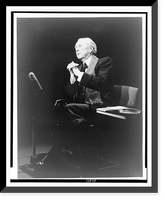 Frank Lloyd Wright, full-length portrait, seated, facing left, during interview, on The Mike Wallace Interview" television program" Classic, Historic Reproduction