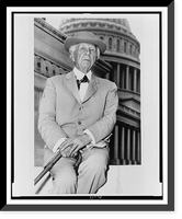 Frank Lloyd Wright, three-quarter length portrait, seated, facing front, outside the U.S. Capitol building Classic, Vintage Poster