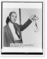 Noose sent to NAACP. Roy Wilkins, NAACP executive secretary, displays hangman's noose sent to Association's national headquarters from Florida Classic, Vintage Print
