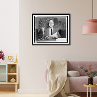 Arthur M. Schlesinger, Jr., half-length portrait, seated at table with microphone, Historic Reproduction
