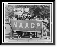 People marching with signs to protest segregation in education at the college and secondary levels.J.H. Lawson, Houston, Texas. Classic, Vintage Print