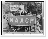 People marching with signs to protest segregation in education at the college and secondary levels.J.H. Lawson, Houston, Texas. Classic, Vintage Print