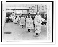 A long line of African Americans picket outside Rich's Department Store, Atlanta, Georgia, in protest against segregated eating facilities at one of its lunch counters, Vintage Poster