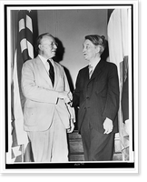 Dr. Alvin Johnson, left in three-quarter length portrait, shaking hands with Jacques Maritain, Antique Poster