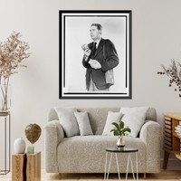 Don Hollenbeck, half-length portrait, facing left, modelling new walkie-talkie set, Antique Poster