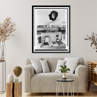 Exhibit of chiefly anti-communist and anti-Jewish propaganda, with books on table and shelves, The Hague, Netherlands, Antique Print