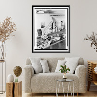 Exhibit of chiefly anti-communist and anti-Jewish propaganda, with book, photographs, and posters on shelves, The Hague, Netherlands Classic, Historic Print