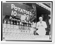 Grocer Alfred Freese Port Washington, Wis., holds potatoes in front of sign painted on store window encouraging customer not to purchase potatoes, Vintage Poster