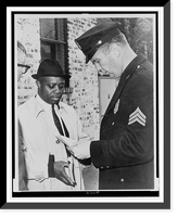 Historic Framed Print, Joseph X talking to cop showing him court order to take possession of house.World Telegram & Sun photo by O. Fernandez.,  17-7/8" x 21-7/8"