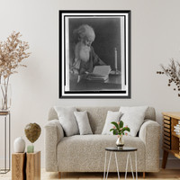 John Burroughs, half-length portrait, seated at table, facing right, reading, with candle.Greene. Classic, Historic Print