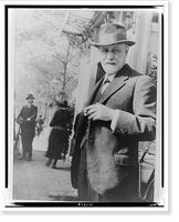 Historic Framed Print, [Sigmund Freud, half-length portrait, facing left, standing on sidewalk outside The Hague, Netherlands],  17-7/8" x 21-7/8"