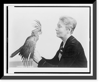 Winsome Washington woman has rare parrot for pet.Underwood & Underwood, Washington, Historic Print