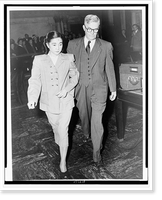 Mrs. Iva Toguri D'Aquino (Tokyo Rose), full-length portrait, being led from Federal Court in San Francisco by U.S. Deputy Marshall Herbert Cole, Historic Reproduction