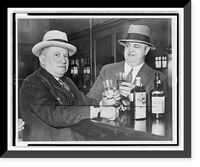Historic Framed Print, Izzy Einstein (l) sharing a toast with Moe Smith in a New York bar].World Telegram staff photo.,  17-7/8" x 21-7/8"