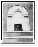 Ex-President Wilson and Mrs. Wilson at the window of their home, from where Mr. Wilson saluted the Delegation of the United Daughters of the Confederacy, Historic Reproduction