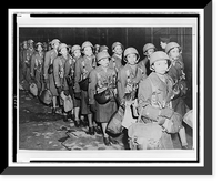 First African American members of the Women's Army Corps assigned to overseas duty get off a train at night in England Classic, Antique Poster