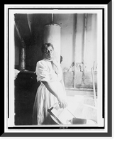 African American woman, three-quarter length portrait, standing, facing front, doing laundry at wash tub, in Washington, D.C. or New York, Vintage Print