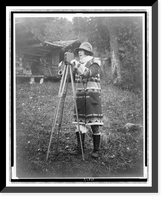Historic Framed Print, [Evalyn Walsh McLean, full-length portrait, standing, facing left, with camera on tripod],  17-7/8" x 21-7/8"