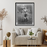 Historic Framed Print, [Evalyn Walsh McLean, full-length portrait, standing, facing left, with camera on tripod],  17-7/8" x 21-7/8"