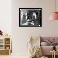 Historic Framed Print, [William F. Buckley, Jr. shaking hands with Sen. Robert F. Kennedy at El Morocco Restaurant],  17-7/8" x 21-7/8"