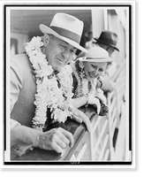 Edgar Rice Burroughs and wife, wearing leis, leaning over ship's rail as they arrive in Hawaii, Vintage Poster