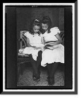 Two girls wearing white dresses and dark stockings reading a book - 2, Historic Print