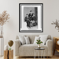 Historic Framed Print, [Unidentified group of three men, full-length portrait, two seated, one standing in the background, facing front],  17-7/8" x 21-7/8"