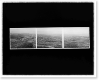 Winter view of pollution, Reno from the hills above West 7th Street, looking east, 1990: a triptych, Vintage Print