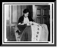 Alice Paul, half-length portrait, seated, facing slightly right, sewing suffrage flag, Vintage Poster