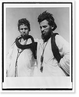 Historic Framed Print, [Man standing, with arm around another man, half-length, Dra Wadi, Morocco],  17-7/8" x 21-7/8"