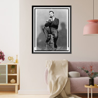 Pete Fountain, full-length portrait, seated, facing front, playing clarinet Classic, Vintage Wall Art