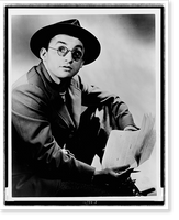 Arch Oboler, half-length portrait, seated, facing right, wearing hat and glasses, holding paper and pencil, Antique Wall Art