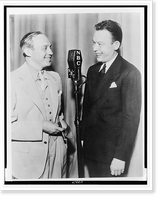 Fred Allen (right) and Jack Benny, three-quarter length portrait, standing before microphone, facing each other Classic, Historic Print
