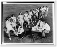 Eleven finalists, selected from 250 students at Mount San Antonio College, Pomona, competing for the Queen of the Los Angeles County Fair, stand on lawn, in front of judges Antique Wall Art Print
