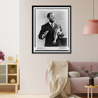 Historic Framed Print, [Louis Armstrong, half-length portrait, standing, facing front, holding trumpet],  17-7/8" x 21-7/8"