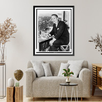 Curt Gowdy, three-quarter length portrait, seated at microphone in stadium, facing left, Antique Wall Art
