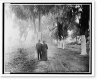 Booker T. Washington with Nannie H. Burroughs in Daytona, Florida, full-length portrait, standing on street, facing front, Antique Wall Art