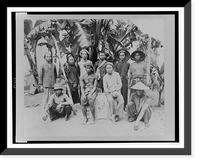 Historic Framed Print, [Group of ten workers posed by palm trees, Saigon, South Vietnam],  17-7/8" x 21-7/8"