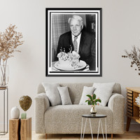 Historic Framed Print, [Robert Frost, poet poses with his birthday cake on his 85th birthday].World Telegram photo by Walter Albertin.,  17-7/8" x 21-7/8"