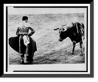 Matador Emilio Redondo holds cape before a bull which has been stabbed several times, Vintage Wall Art