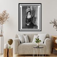 Young African American woman, three-quarter length portrait, facing slightly right, with hands folded on her lap, Historic Print