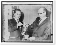 Georgia governor Lester G. Maddox pours a cup of coffee for former Alabama governor George Wallace at the governor's mansion in Atlanta, Vintage Poster