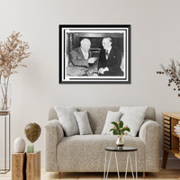 Nikita Khrushchev (left) converses with British Prime Minister Harold Macmillian at the Soviet New York headquarters following Macmillan's disarmament address to the United Nations Heritage Wall