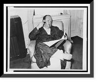 Alfred Hitchcock, full-length portrait, seated in a recliner, shaving and reading, Antique Print
