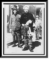 Historic Framed Print, [Roald Amundsen, full-length portrait, standing, facing front, arriving in Nome, Alaska, after his transpolar flight from Spitzbergen to Alaska],  17-7/8" x 21-7/8"