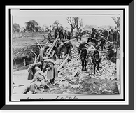 Soldiers constructing a river crossing near a destroyed bridge as a horse team, pulling a casson, crosses.Evgenii Khaldei, Historic Print