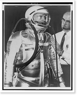 Alan B. Shepard, half-length portrait, facing right, being fitted for life-support space suit by a B.F. Goodrich technician, Vintage Poster
